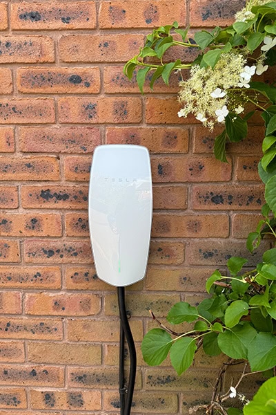 Tom's Electrical Services EV Charger Installation - EV Charger on wall